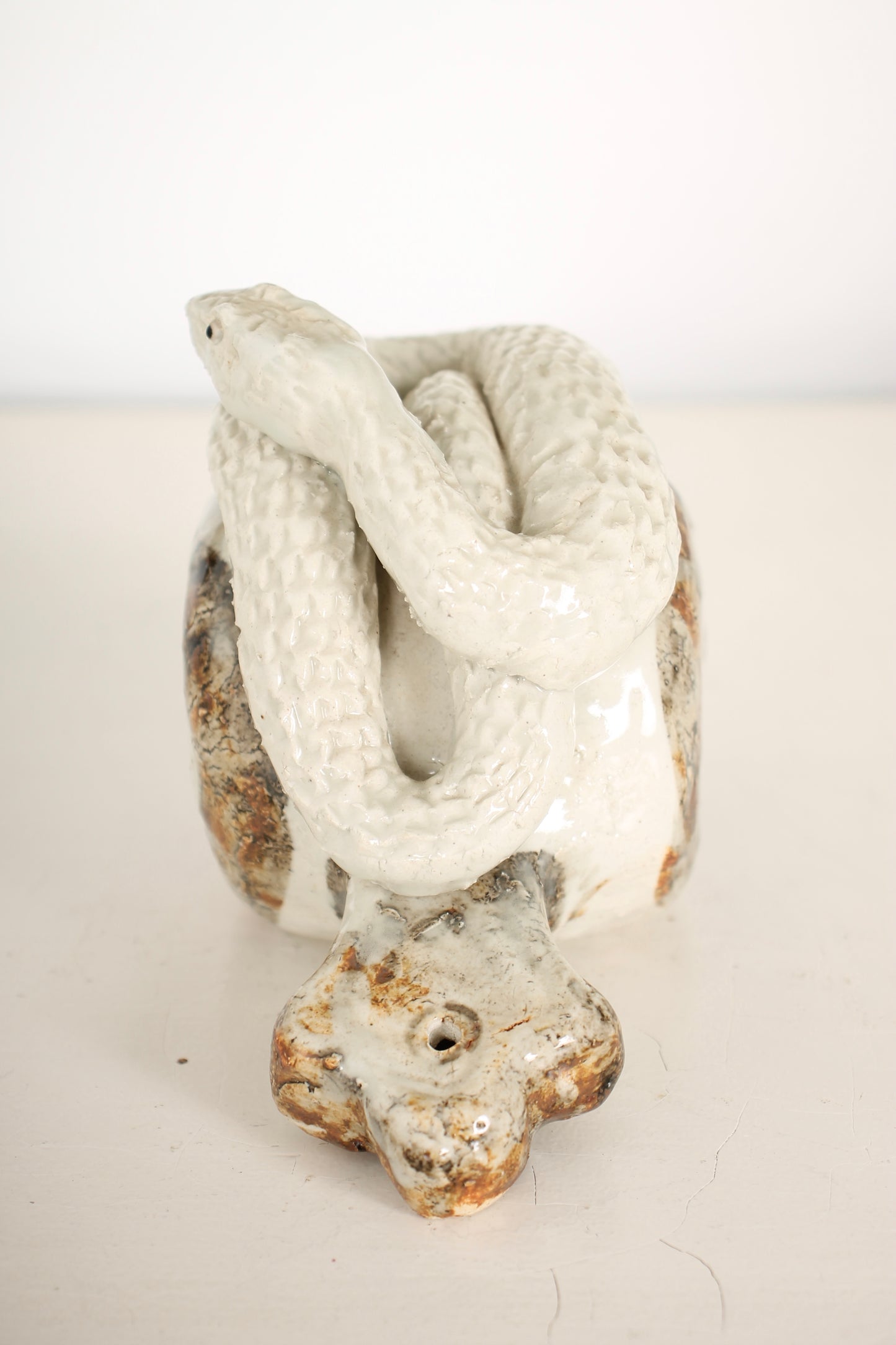 Vintage Japanese Ceramic Snake on a Mallet Sculpture