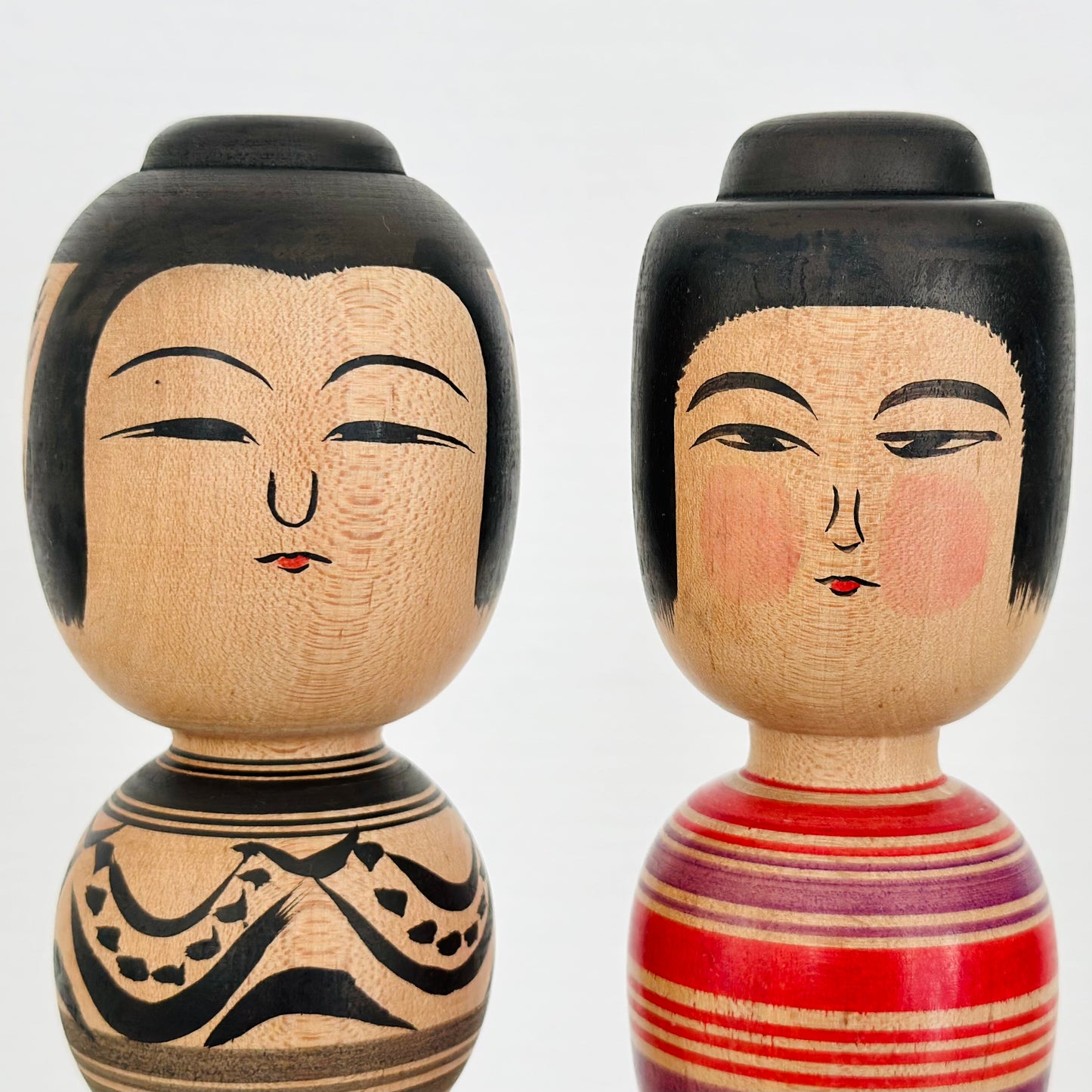 Pair of Vintage Japanese Kokeshi Doll Black Flower and Red Daruma