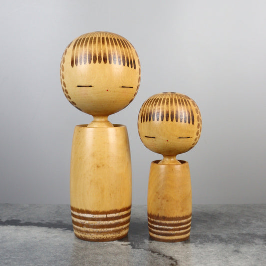 Pair of Kokeshi Dolls by Kano Chiyomatsu