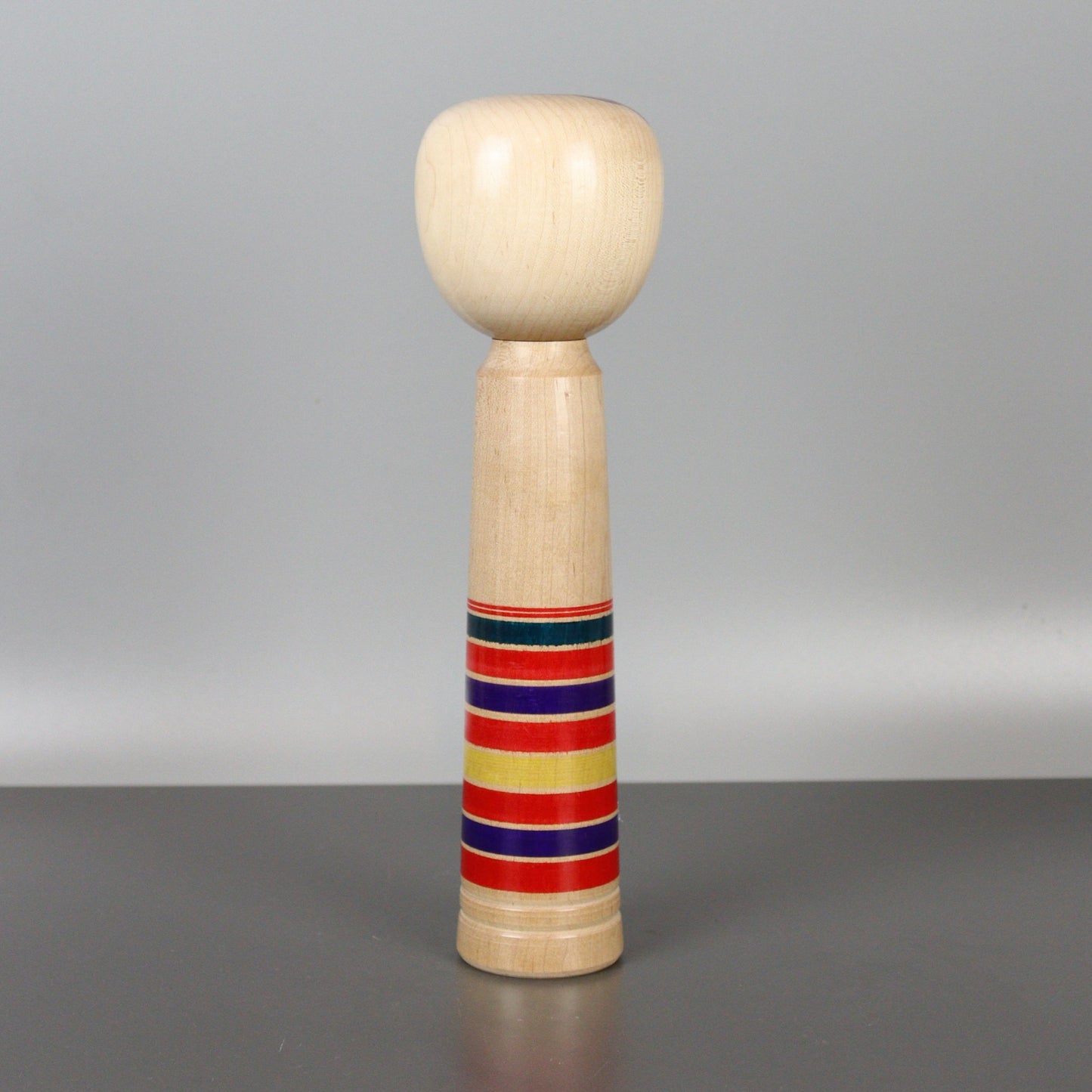 Musical Kokeshi Doll Colorful Stripes