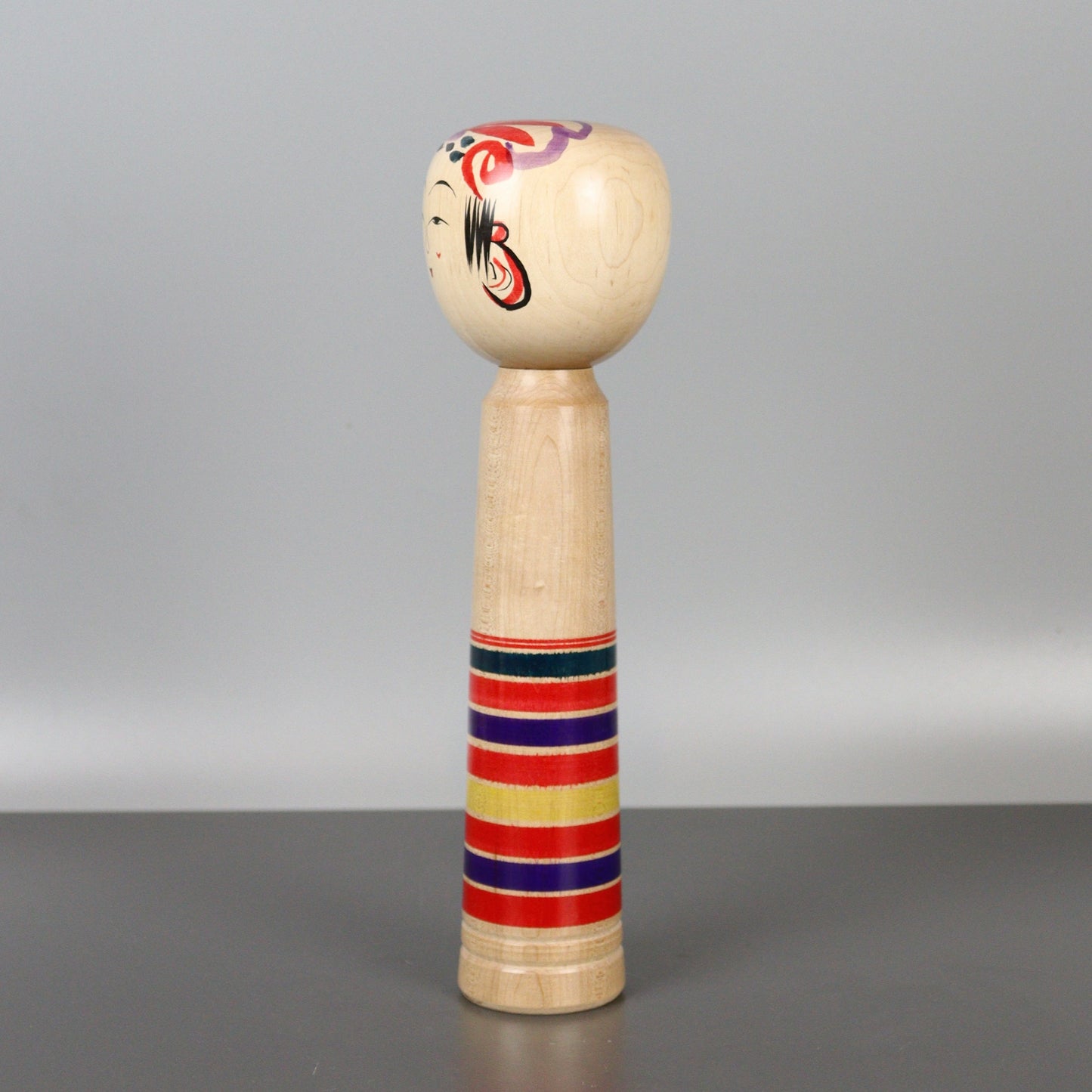 Musical Kokeshi Doll Colorful Stripes