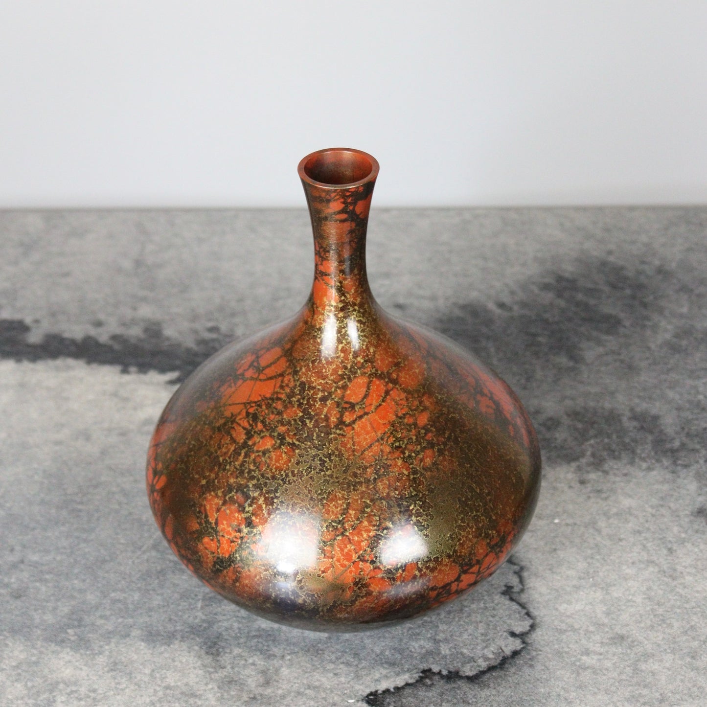 Reddish Orange and Black Bronze Vase with Gold lines