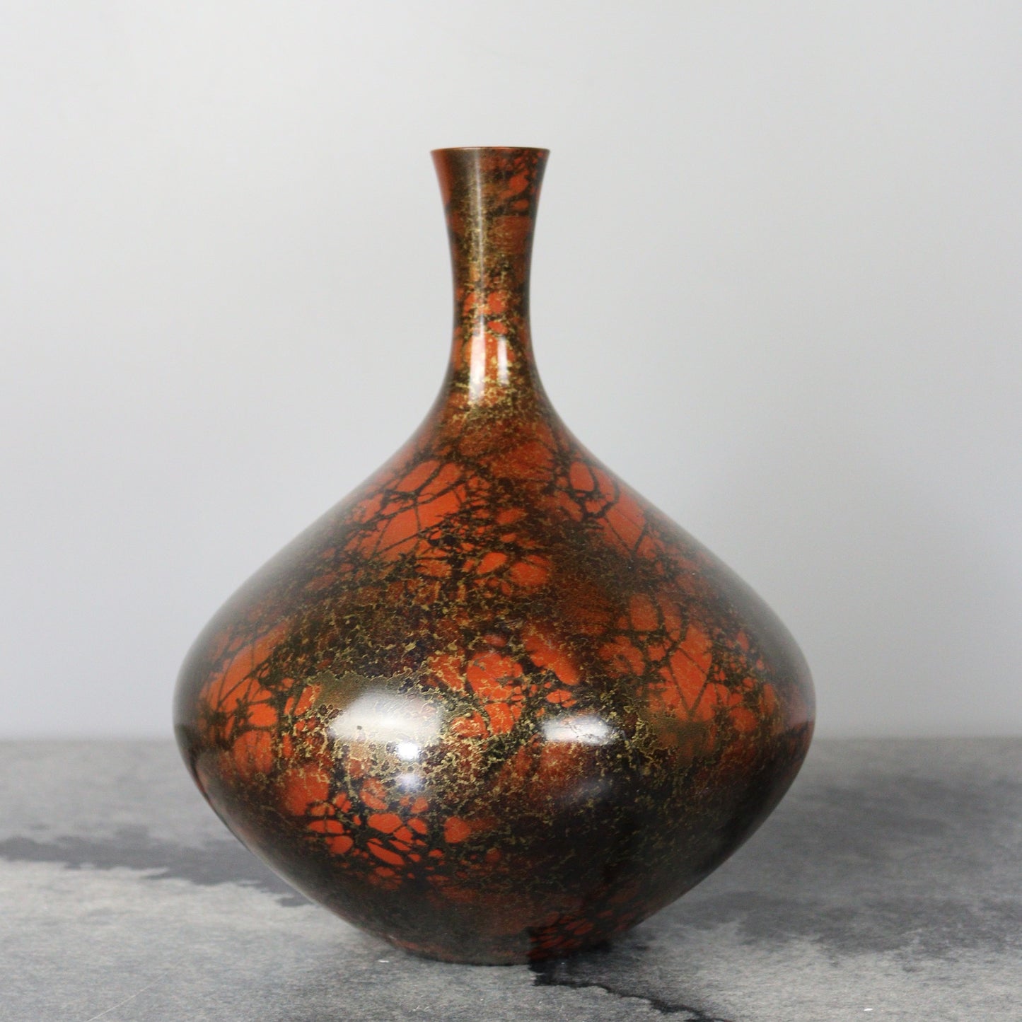 Reddish Orange and Black Bronze Vase with Gold lines